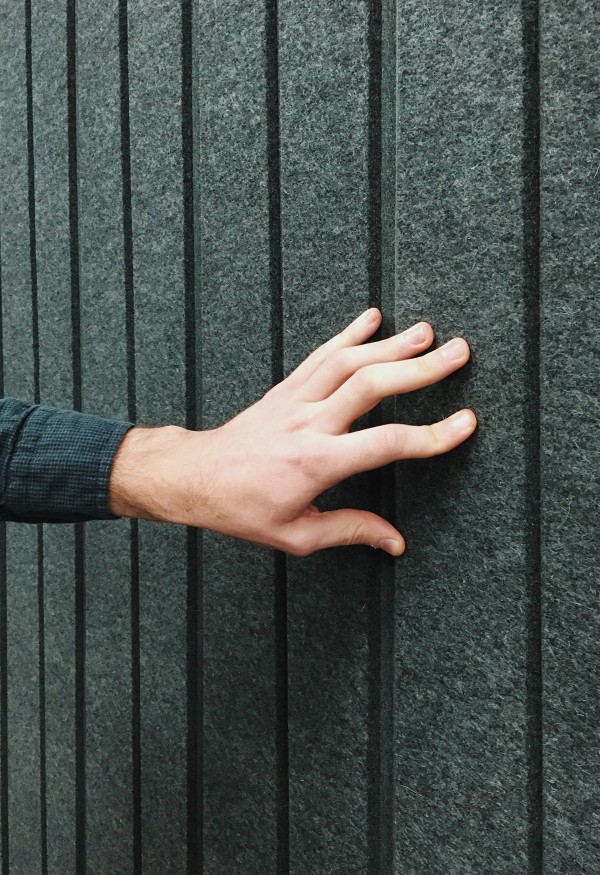 ARO hand on wall