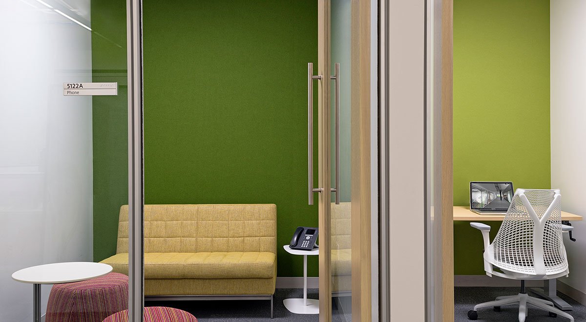 Autodesk with green felt wall install 