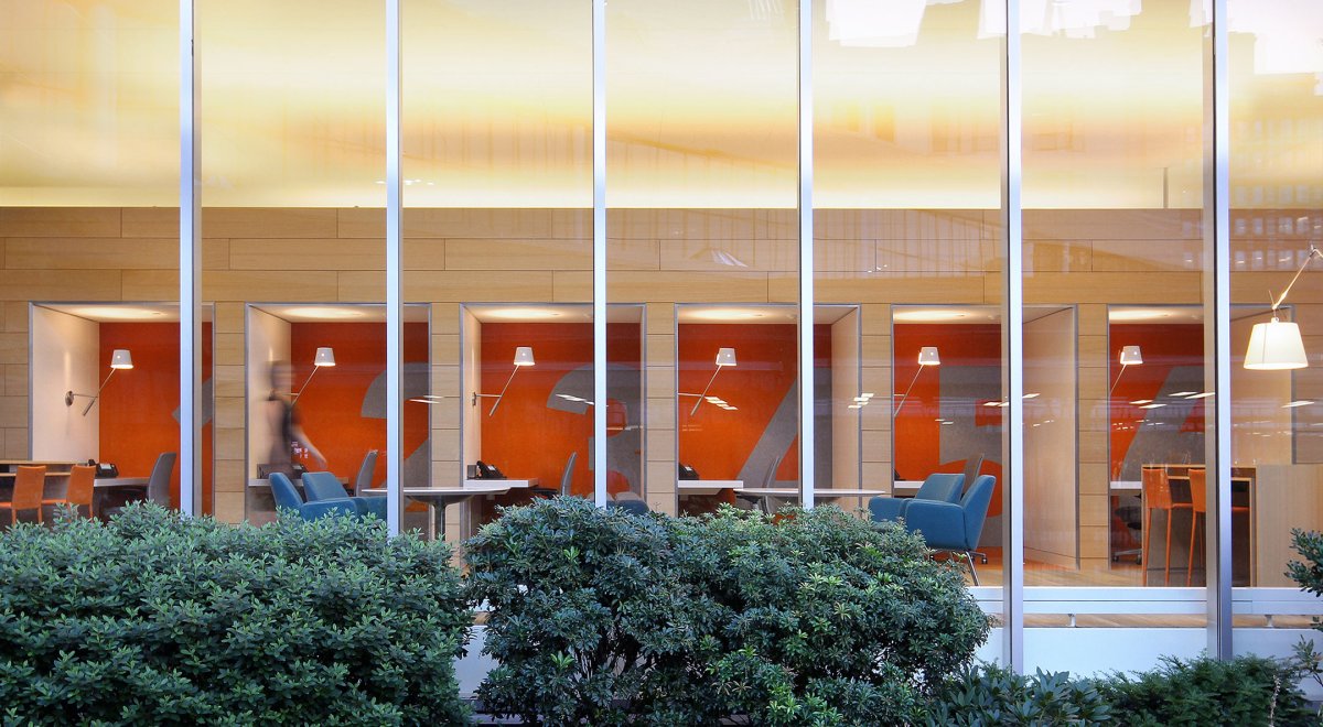 Financial Services Corporation private work areas with orange walls 