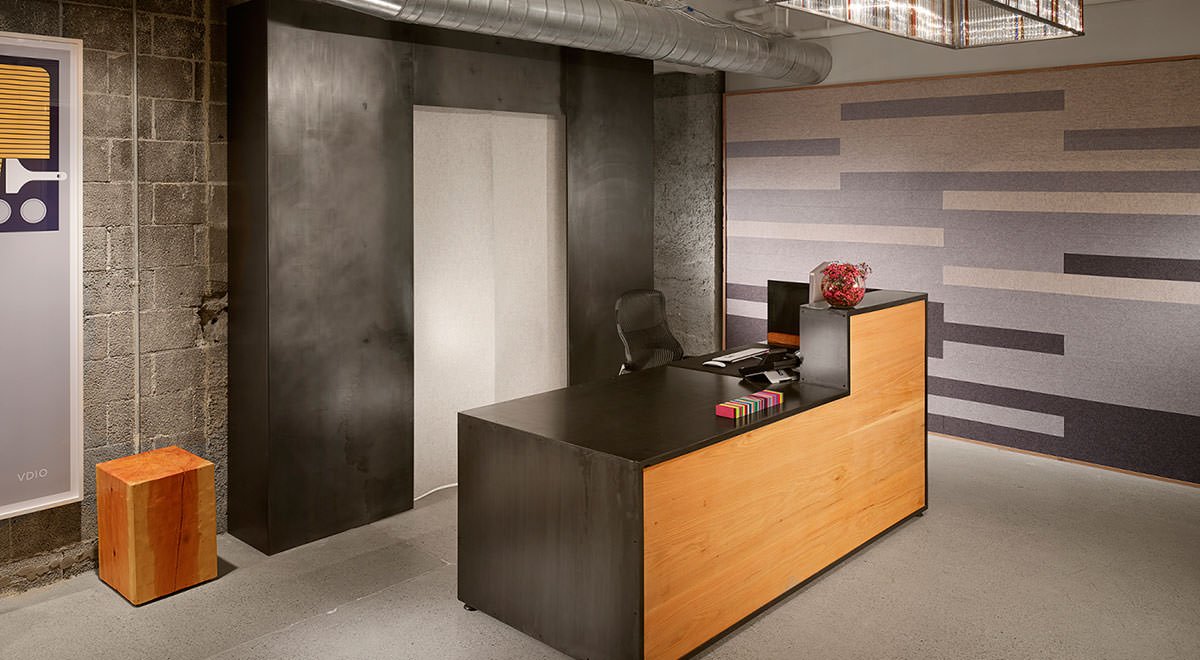 RDIO front desk with felt wall