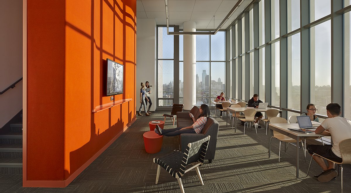 Temple University common space with orange wall